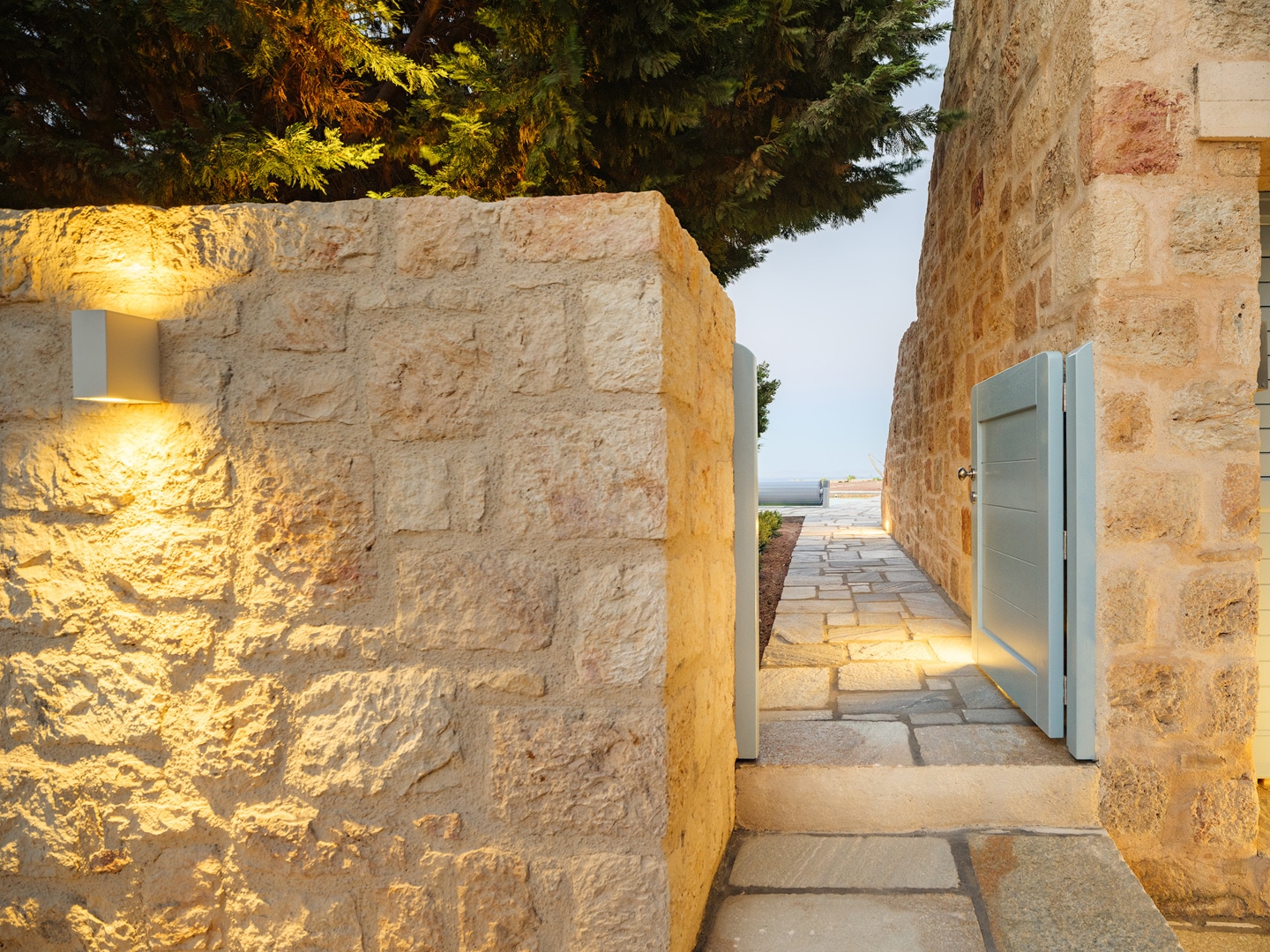 Luxury villa poolside with loungers at Patmos adults-only retreat