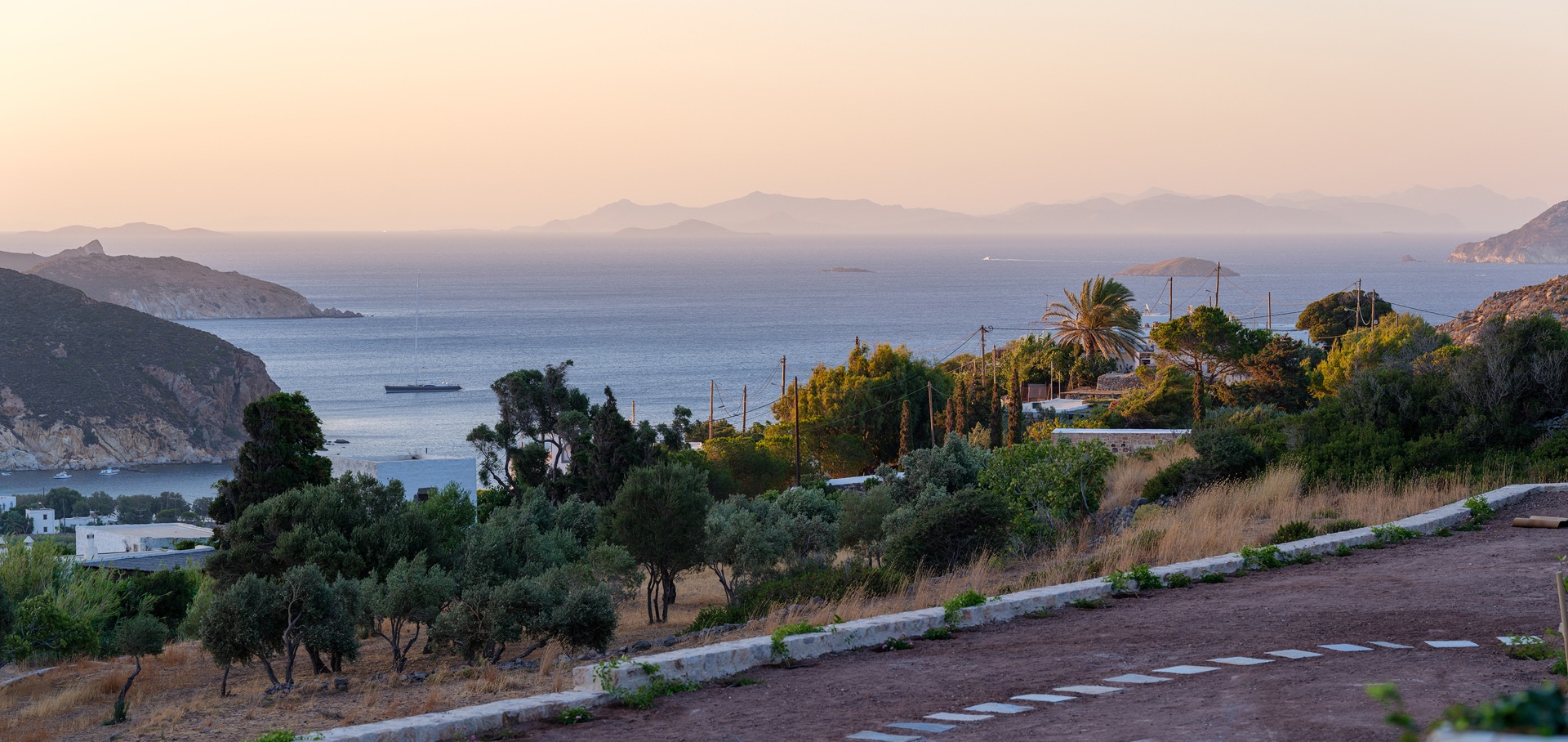 Sunset view over Kampos Bay from Patmos adults-only hideaway