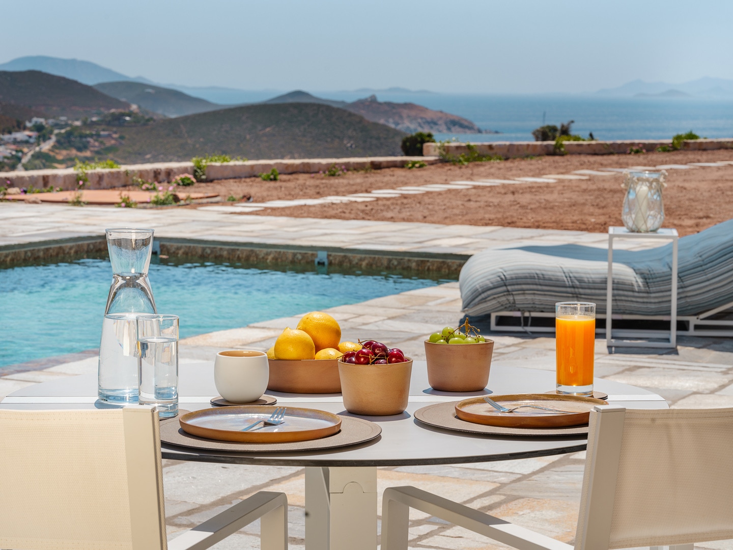 Breakfast with fresh fruit by the salt-water pool in Patmos