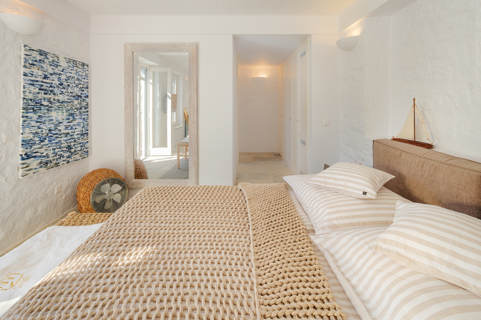 Double bed with fine linens in Patmos luxury hideaway