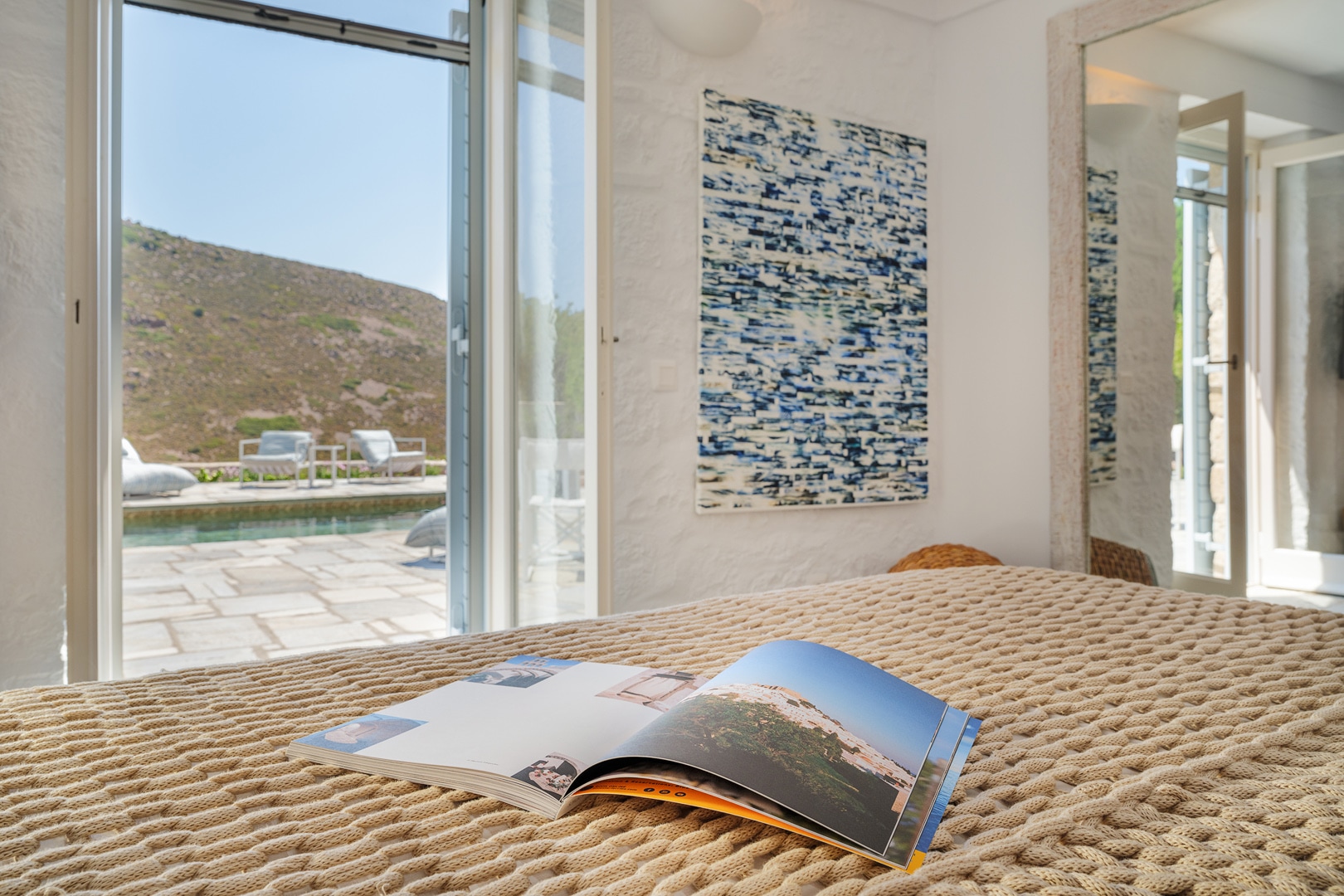 Open bedroom view with natural light at Patmosphere Luxury Escape