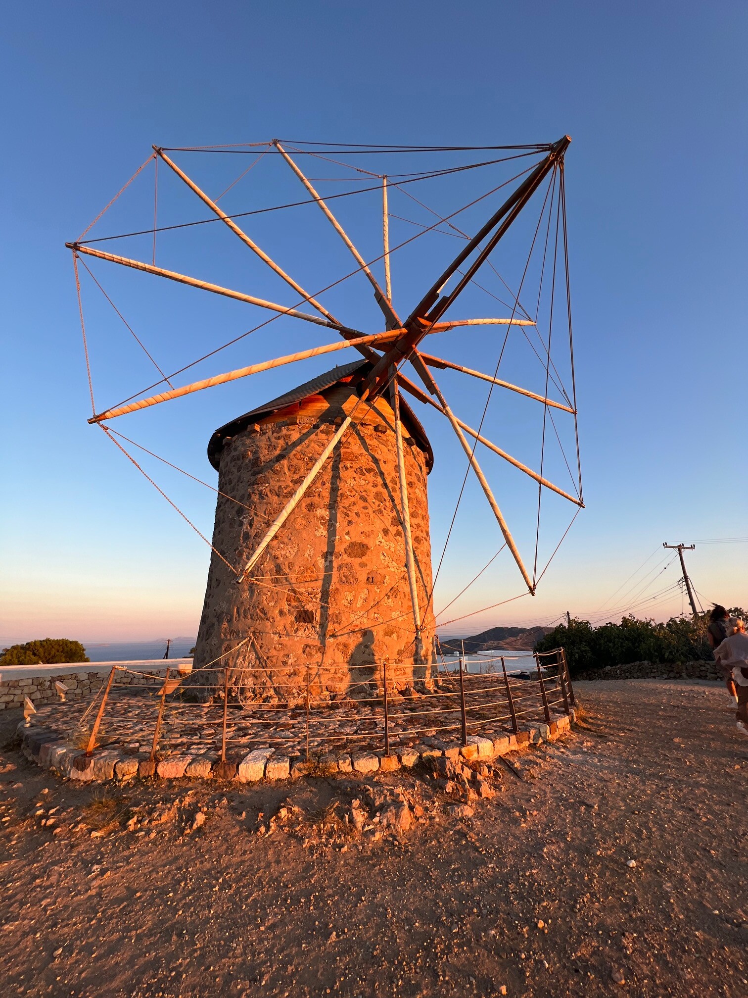 Traditional Patmos windmill at sunset – iconic island landmark