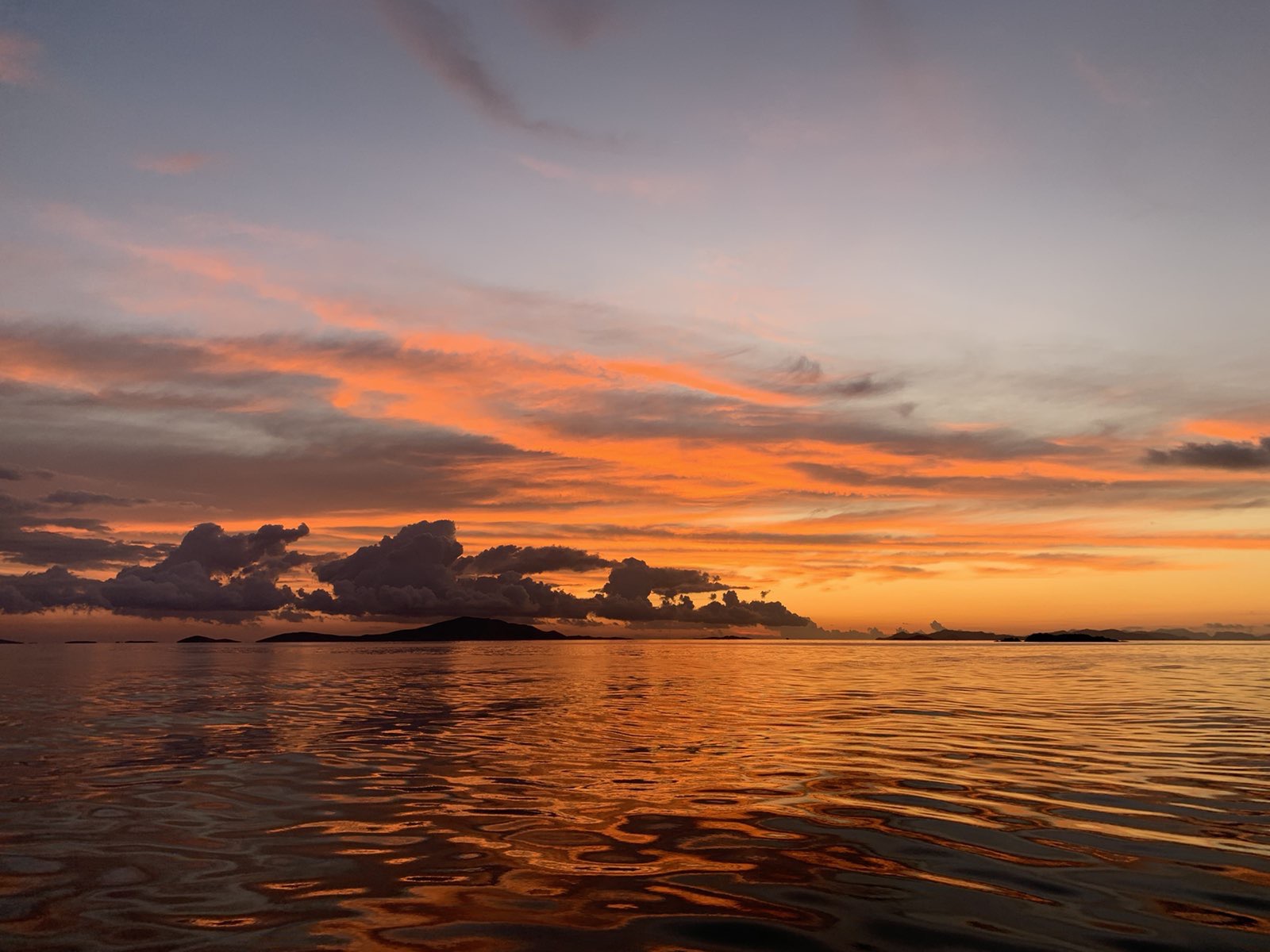 Golden sunset sky over the Aegean Sea near Patmos island
