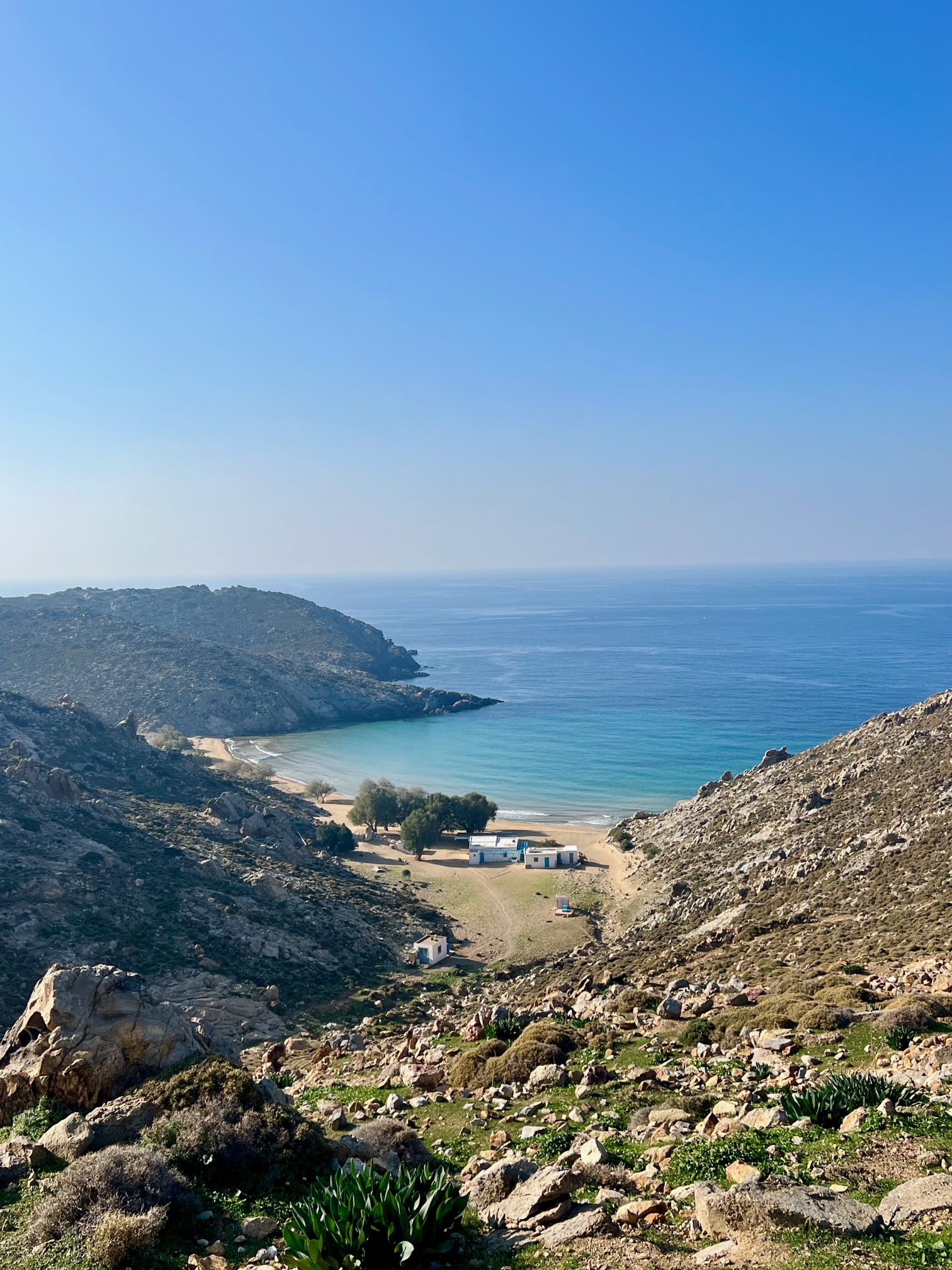 Panoramic view of secluded bay and sandy beach on Patmos island
